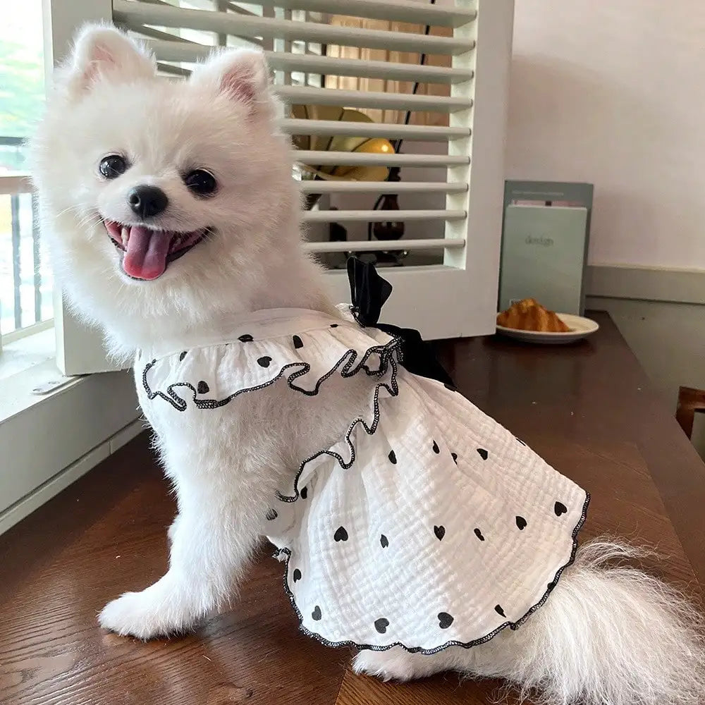 Pet Dresses And Supplies For Spring And Summer, Suitable For Dogs And Cats Like Teddy, Bichon Frise, And Pomeranian. Features Include Cute Love-Themed Dog Outfits.