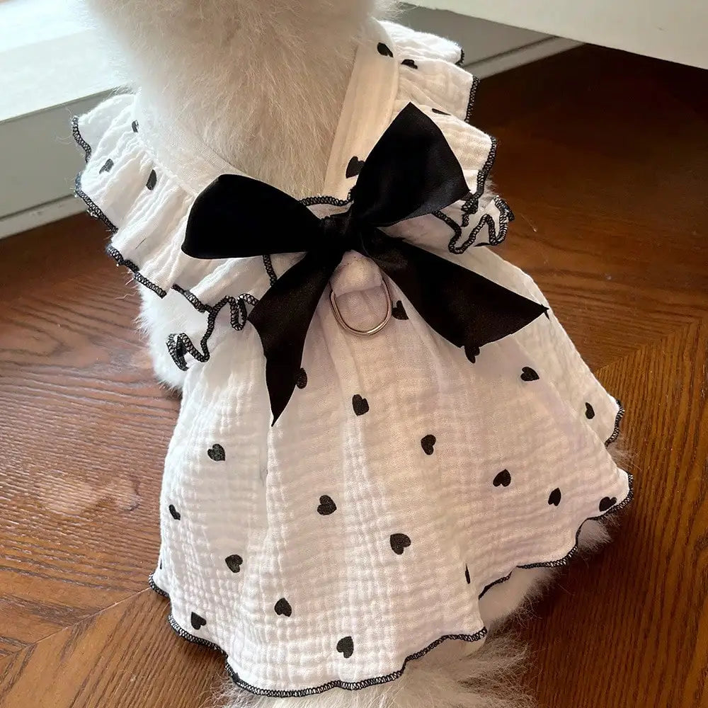 Pet Dresses And Supplies For Spring And Summer, Suitable For Dogs And Cats Like Teddy, Bichon Frise, And Pomeranian. Features Include Cute Love-Themed Dog Outfits.